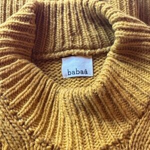 BABAA sweater dress in Ochre 

This is a knockout piece !
